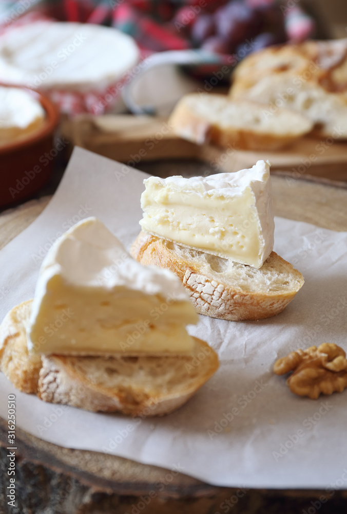 French dessert. Two slices of Camembert cheese on bread