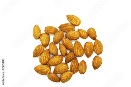 Fresh Almonds spread on white background.
