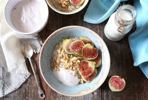 Wallpaper Mural Oatmeal, yogurt, ripe figs, walnutsin bowl and milk Torontodigital.ca