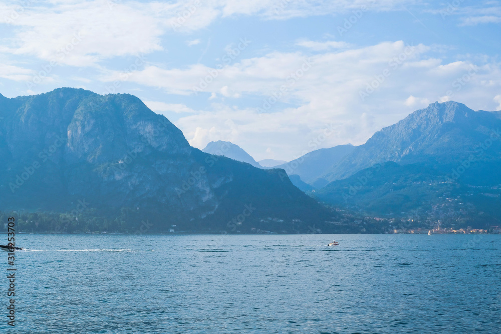 Mountain landscape with Como Lake or Lago di Como, popular tourist attraction in Lombardy, Northern Italy.