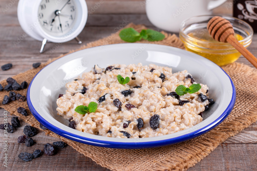 Bowl of oatmeal with raisins