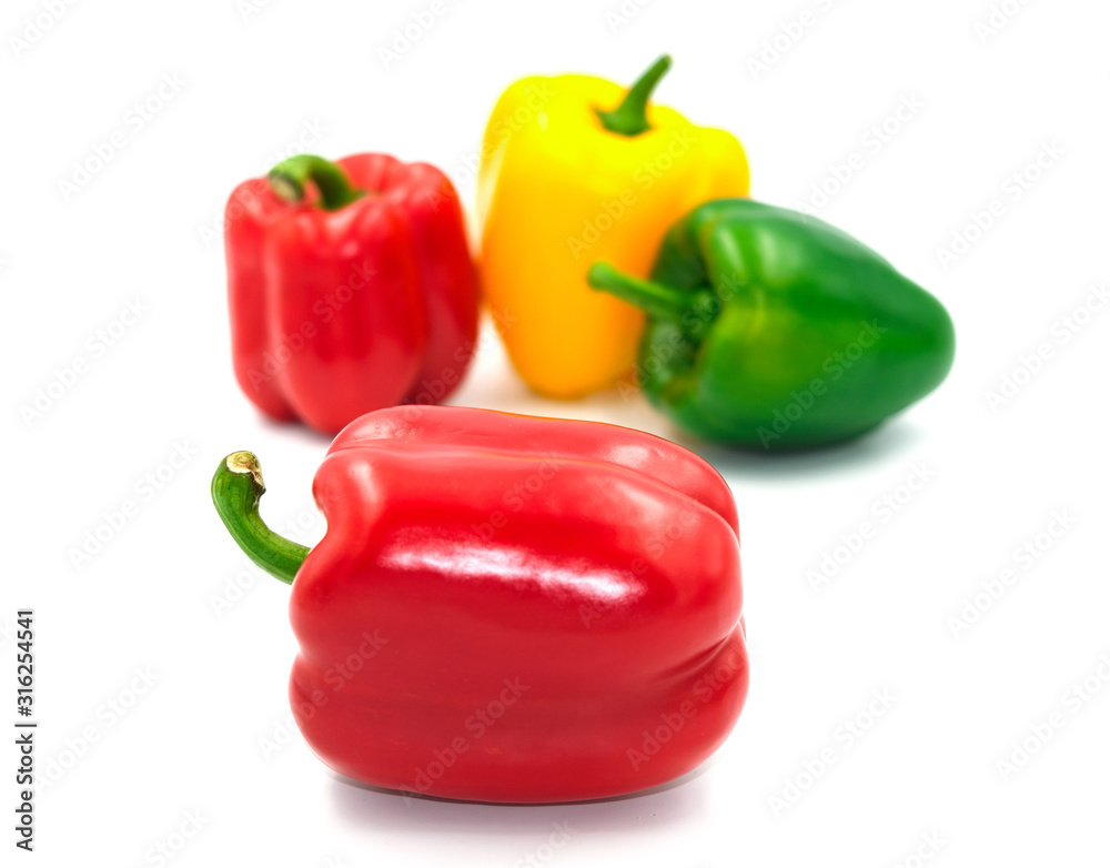 group of beauty shape capcicum decoration food. selective focus big fresh red. Yellow green sweet peeper or bell pepper vegetable. Isolated on white background group of beauty shape capcicum decoration food. selective focus big fresh red. Yellow green sweet peeper or bell pepper vegetable. Isolated on white background