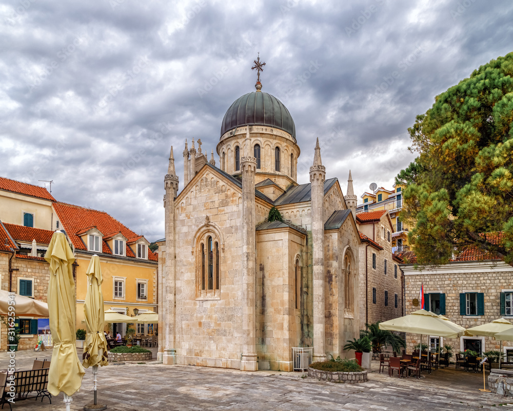 Fototapeta premium Herceg Novi, Montenegro, central square. Orthodox Church of St Michael the Archangel in the old town.