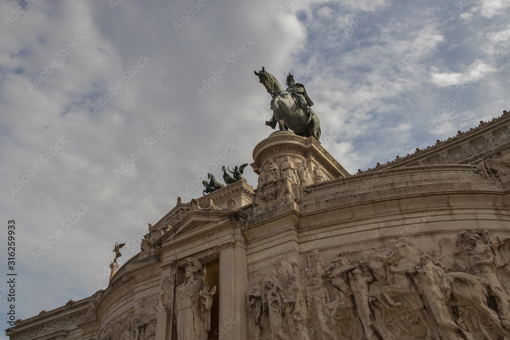 Statue of rider and horse overlooking downtown Rome, Italy