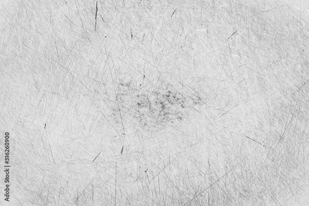 Grunge scratched texture, black and white background. Grunge scratched texture, black and white background.