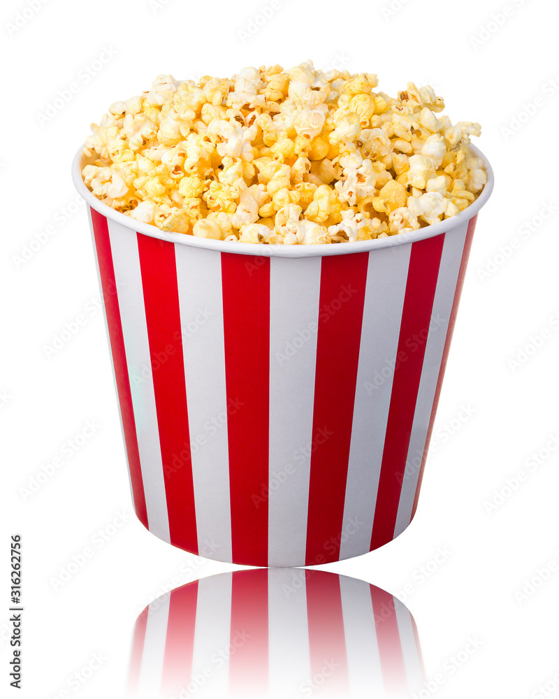 Paper striped bucket with popcorn isolated on white background Paper striped bucket with popcorn isolated on white background