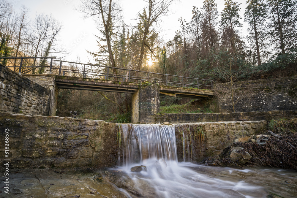 Brusia waterfalls and Bridge in mountains of Forlì