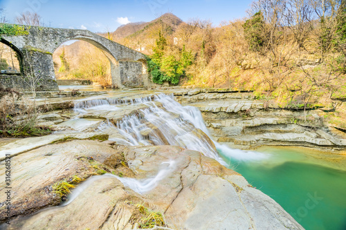 Brusia waterfalls and Bridge in mountains of Forlì photo