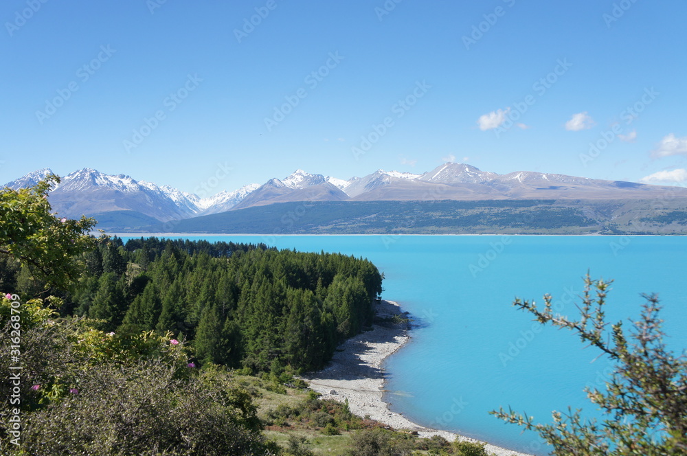 New Zealand Turquoise Color Lake and Snow Mountains New Zealand Turquoise Color Lake and Snow Mountains
