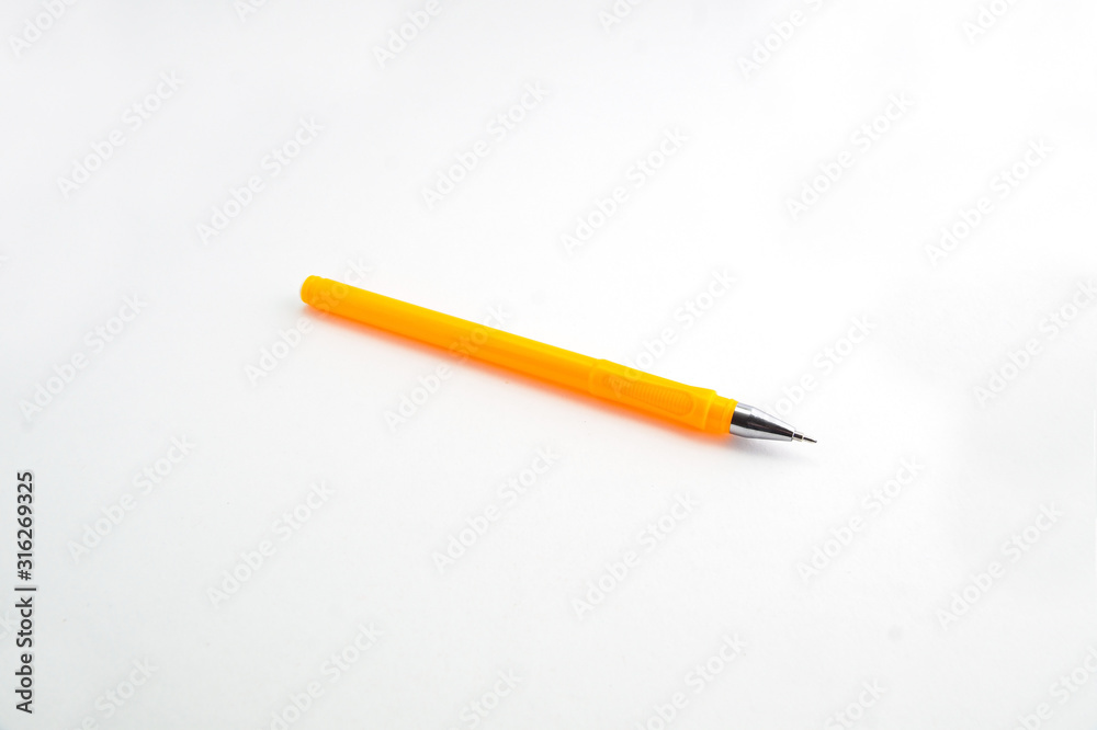 yellow handle plastic pen on a white background