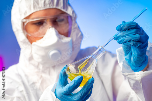 A man in a protective suit ...