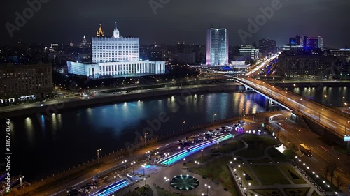 Gimbal timelapse of House of the Government of the Russian Federation in Moscow in night autumn day. Night timelapse of night top shot of House of the Government photo