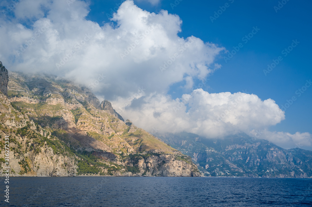 Beautiful seascape with rocks of Amalfi coast. Sailing in Italy.