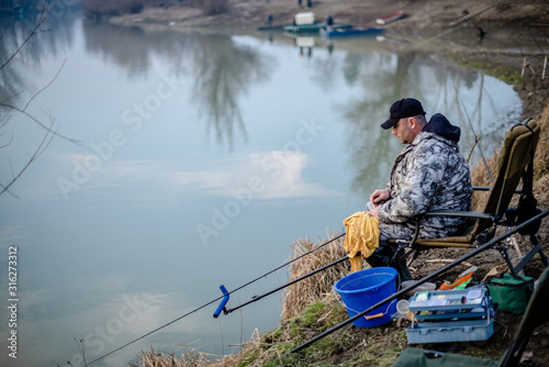 A men fishing on river