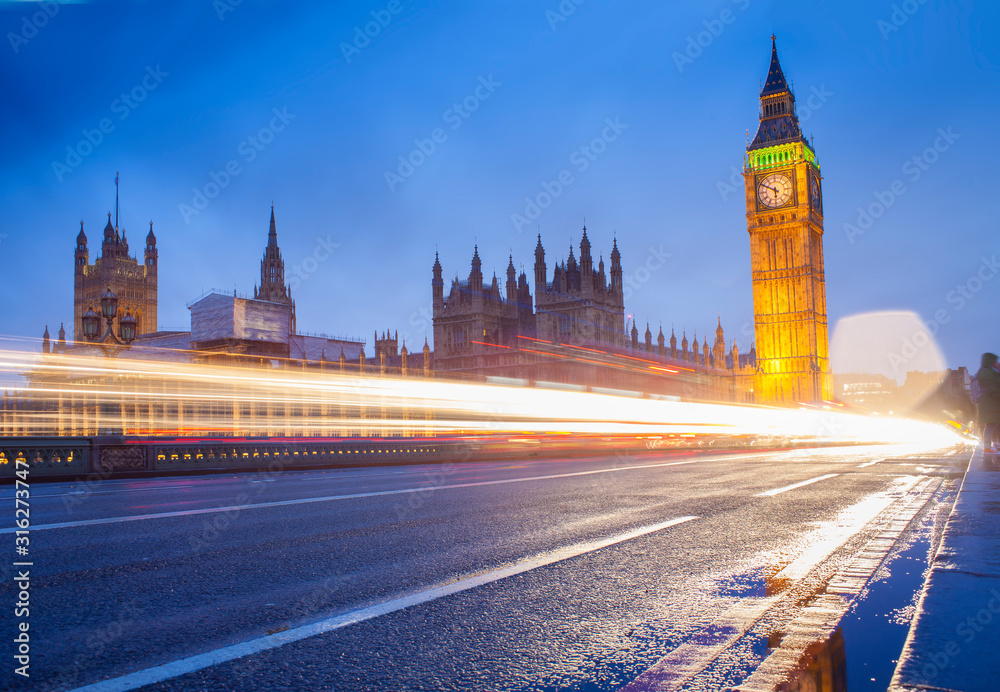 London city scene with Big Ben landmark and car traffic lights, long exposure photo