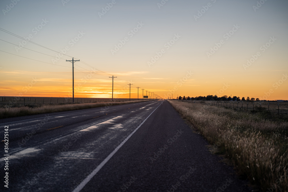road in the sunset near Amarillo, Texas. 