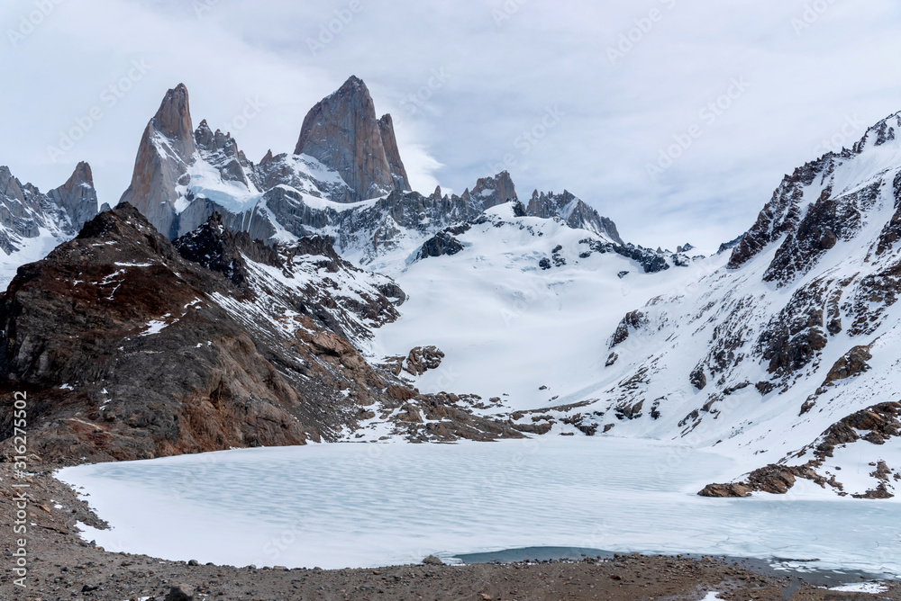 Icy lake melting in the base of FItz Roy Mountain, Patagonia, Argentina