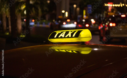 Taxi Cab Sign at Night