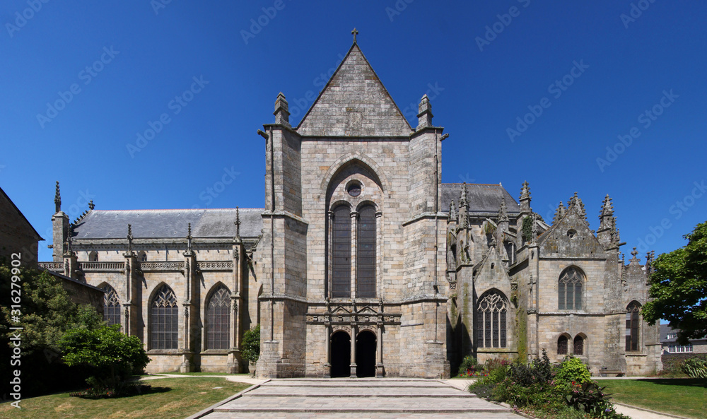 Gothic Saint Malo church with its southern facade and transept in the old town of Dinan, Bretagne in France