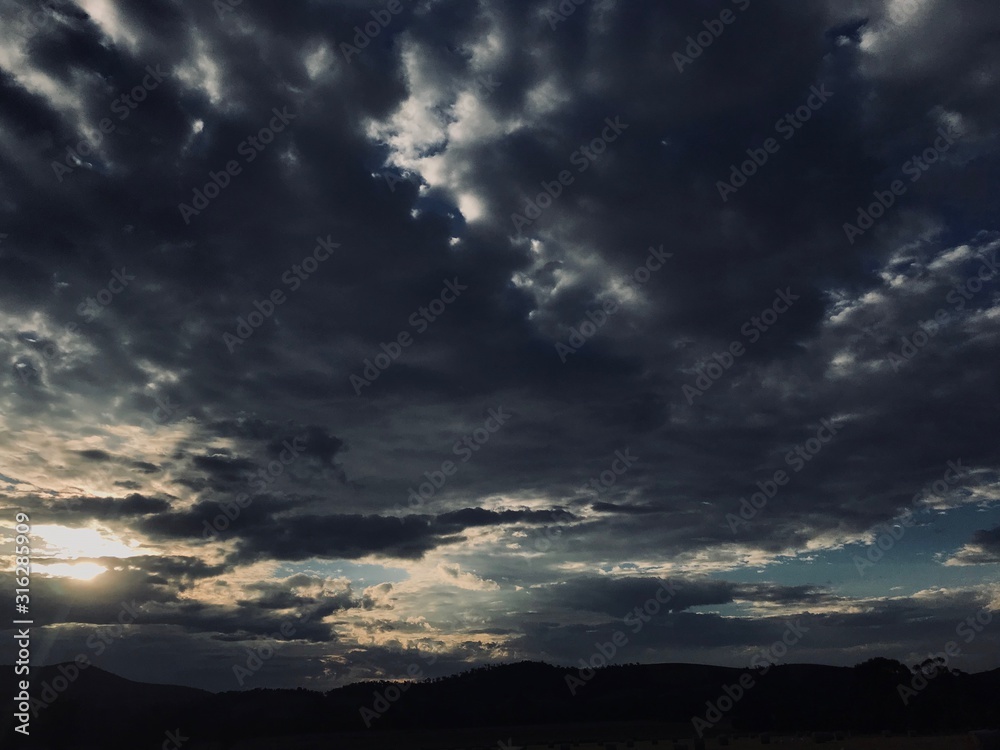 A cloudy sunset on an Aussie farm