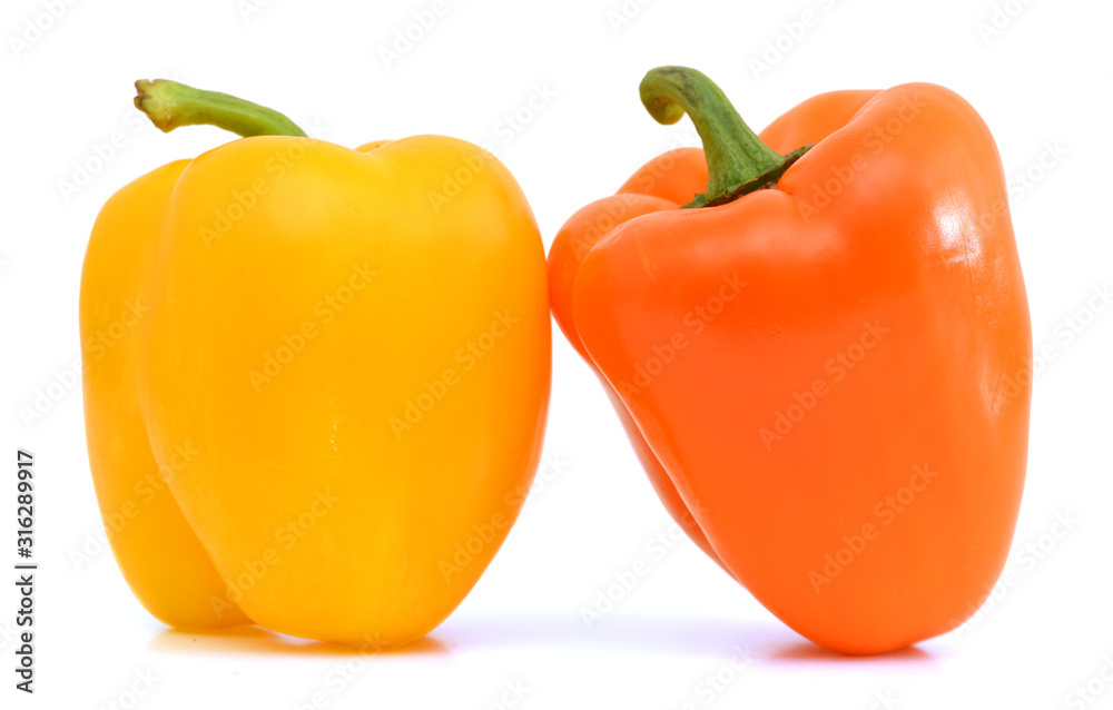 ripe yellow and orange peppers isolated on white background ripe yellow and orange peppers isolated on white background