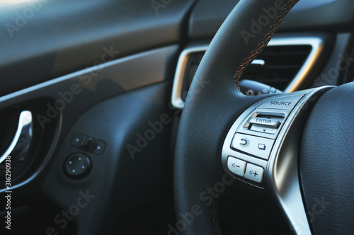 Close-up of a leather steering wheel © Dmitry Perov