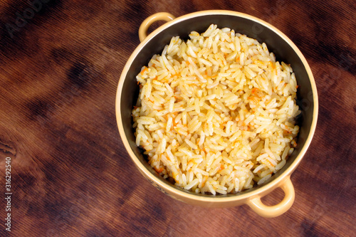 White rice in a ceramic bowl. Vegan healthy food.
