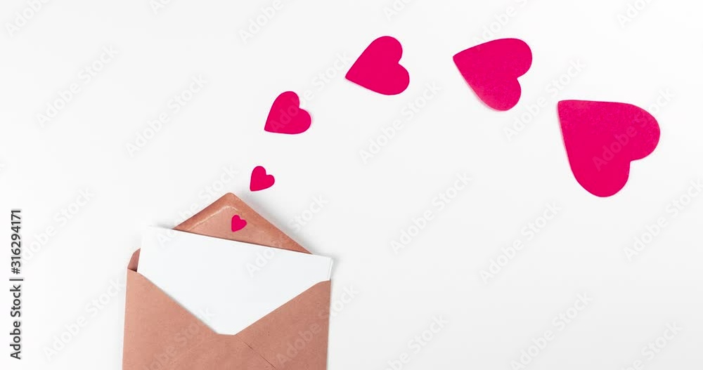 stop motion animation with craft paper envelope and red flying hearts on white background, love, valentines day and wedding greeting concept