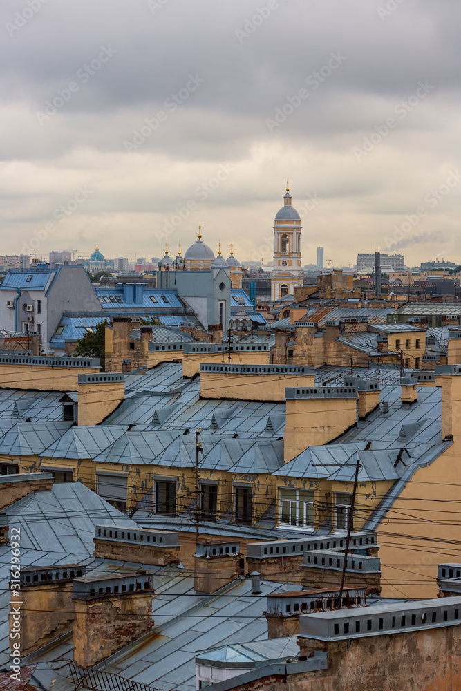 Beautiful top view of the historical city center of St. Petersburg, the roofs of buildings and the bell tower of Vladimir Cathedral. Saint-Petersburg, Russia.