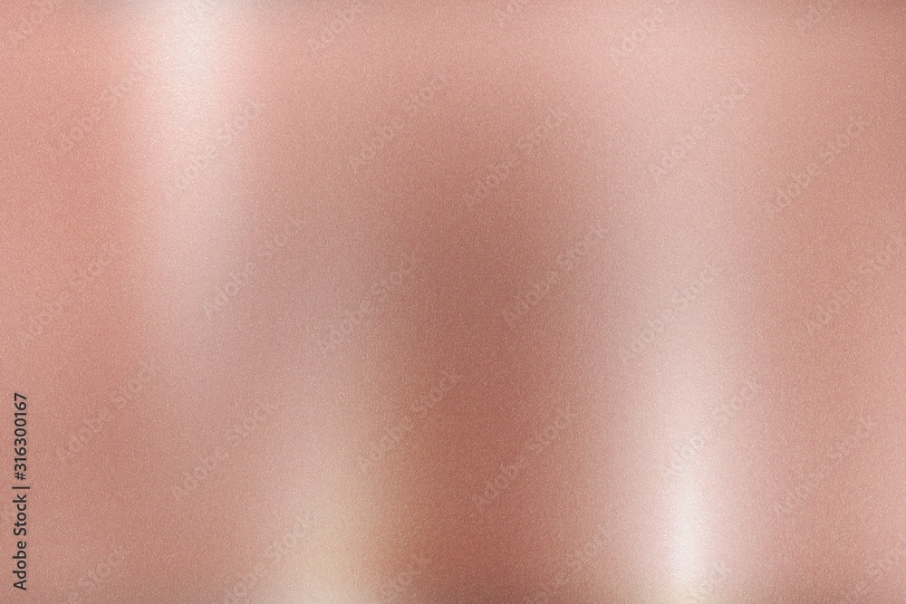 Rose gold foil metallic wall with glowing shiny light, abstract texture background