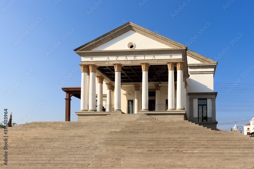 white building with columns in roman style