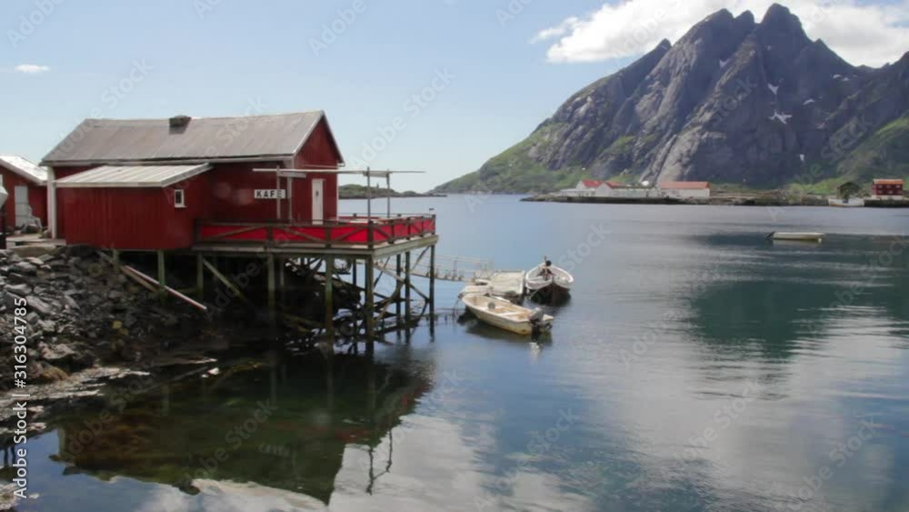 Lofoten Islands Seaside Harbour View (Red Rorbu & Mountains) Lofoten Islands Seaside Harbour View (Red Rorbu & Mountains)