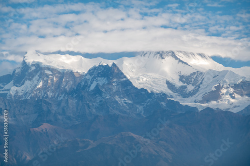 Snow Covered Annapurna II and IV in the Morning Light
