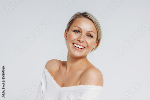 Fotografija Beauty portrait of blonde smiling laughing woman 35 year plus clean fresh face i