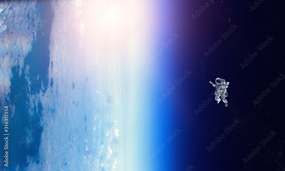 Fototapeta premium Exploring outer space. Mixed media