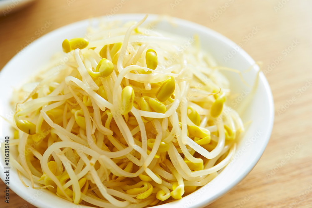 Boiled bean sprout on white plate Boiled bean sprout on white plate