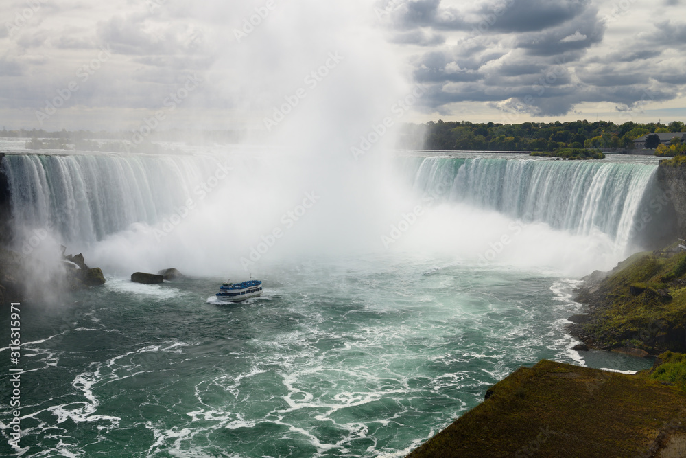 Maid of the Mist sightseeing boat at the Horseshoe Falls Niagara Ontario Canada Maid of the Mist sightseeing boat at the Horseshoe Falls Niagara Ontario Canada