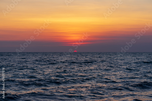 sunset over the sea © preecha