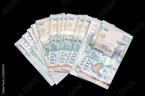 Money is a fan. Banknotes of the Kazakh national currency - tenge with a face value of 10,000