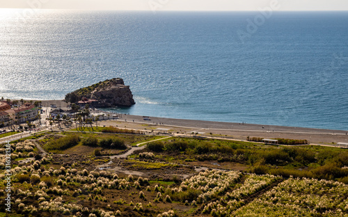 The Rock of Salobreña next to the beach and the Vega