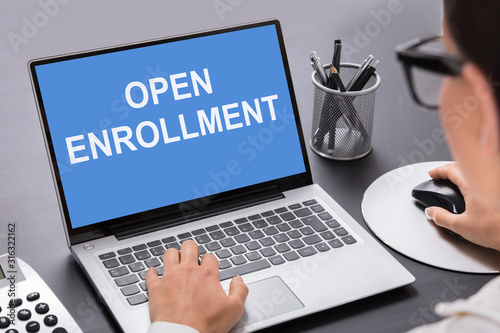 Businesswoman Calculating Invoice