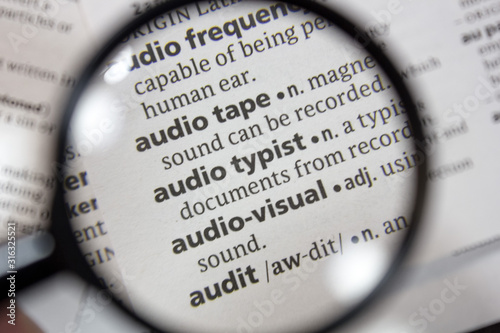The word of phrase - audio typist - in a dictionary.