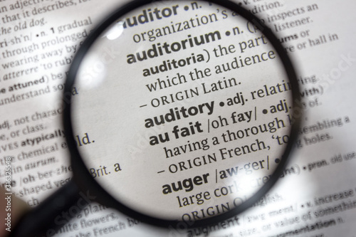 The word of phrase - auditory - in a dictionary.