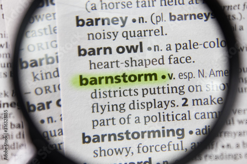 The word or phrase barnstorm in a dictionary. photo