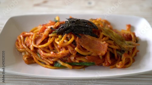 stir-fried noodles with Korean spicy sauce and vegetable photo