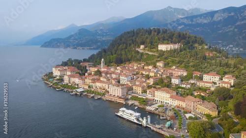 Aerial view. In the frame is the famous Italian city of Bellagio. The spa town is located in the center of Lake Como. Ancient villas and houses are inscribed in a beautiful hilly landscape © kustvideo