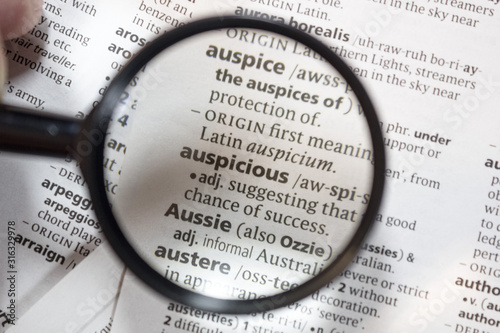The word of phrase - auspicious - in a dictionary.