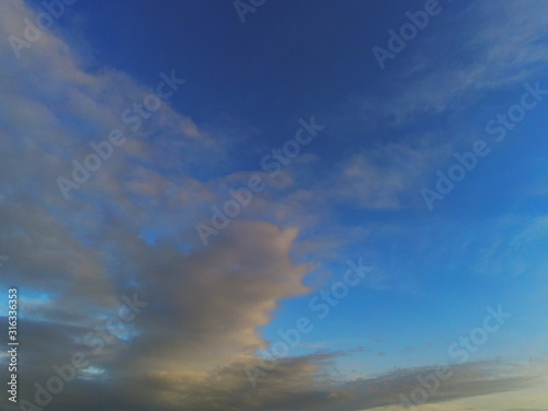 Blue sky with clouds abstract nature background.