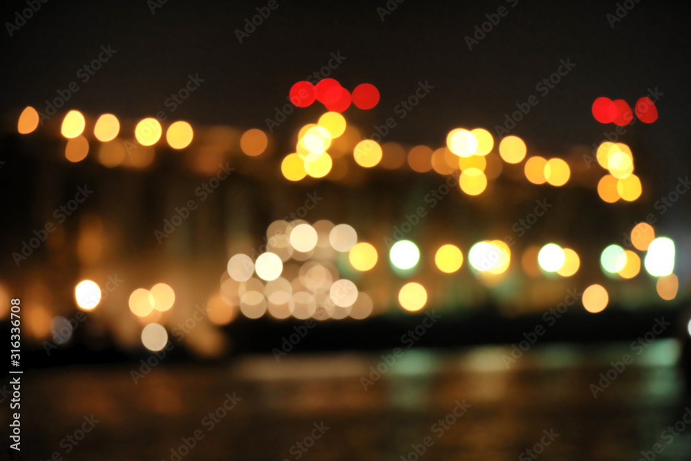 Blurred view of docks at night. Bokeh effect - obrazy, fototapety, plakaty 