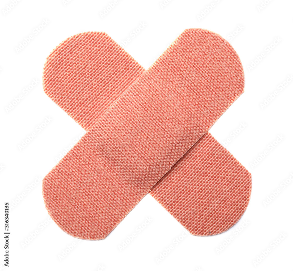 Medical sticking plasters isolated on white. First aid item Medical sticking plasters isolated on white. First aid item